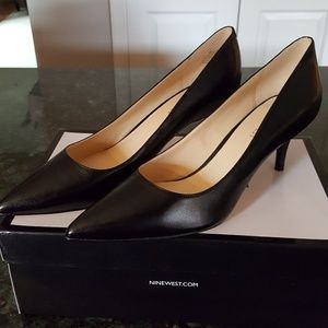 Classic black point toe pumps by Nine West